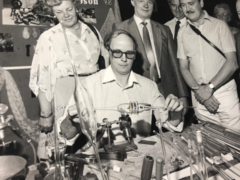 Young demonstrating glassblowing at a German trade fair, 1985